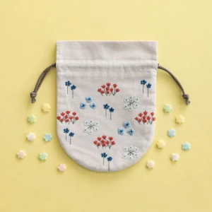 【星あかりの刺繍手帖】丸巾着袋 刺しゅうキット『うたかた』No.556